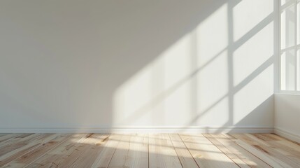 White empty room with wood laminate floor and the sun casting shadows on the wall. Perspective of...