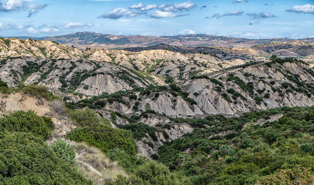view of Aliano badlands (calanchi), landscape made of clay sculptures eroded by the rainwater, Basilicata region, southern Italy