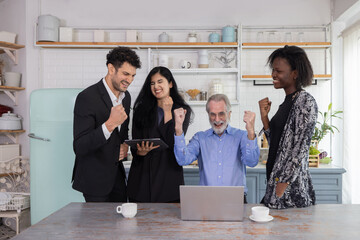 Group of business people raised their fist up for the success meeting in an office pantr