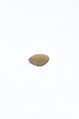 ground pepper on a white background