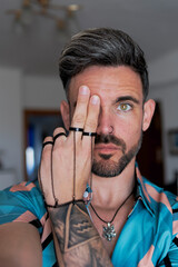 Capturing strength, spirituality, and unwavering self-confidence in a modern self-portrait, one eye...