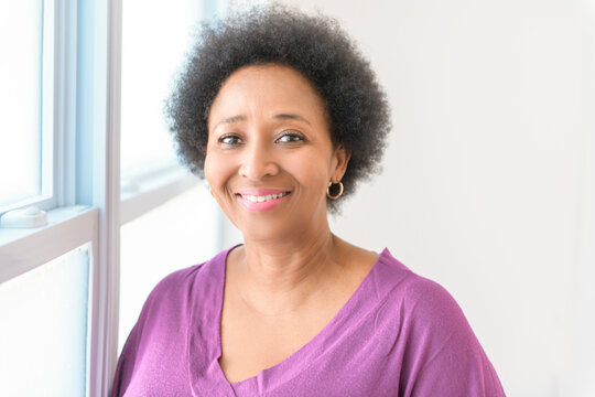 senior black American woman on white background studio