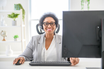 nice Portrait of an black business woman sit at the office with microphone talk to client