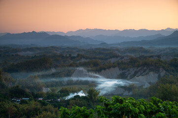 In the morning, smoke curls up from the valley and the bamboo forest is green. The Erliao tribe in...