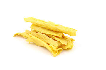 Tofu skin on a white background. Dried yuba sticks or Fuzhu on white background. Tofu skin. dried bean curd.