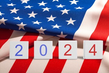 Fototapeta na wymiar United States 2024 presidential election on wooden cubes