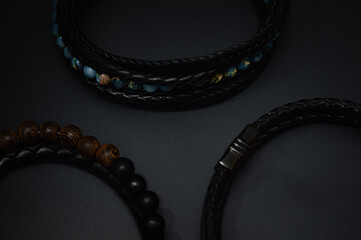 Fototapeta premium Dark accessories still life with focus on textures.