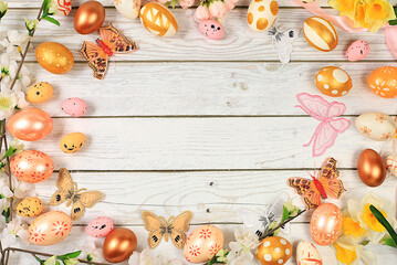 Happy Easter concept, Composition with decorated Easter eggs, butterflies and apple tree branches. banner or advertisement for screen or store, template for design, spring card,