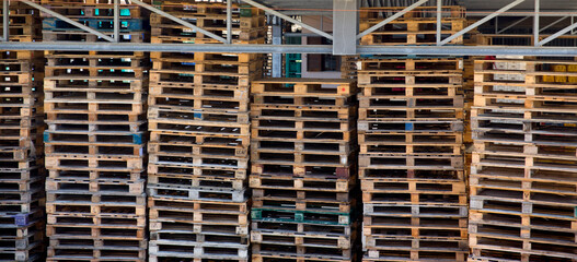 Many rows of pallets in a warehouse