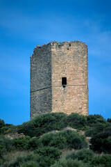 Fototapeta na wymiar The medieval Doria tower, located on the top of a hill in the municipality of S.M.Coghinas, in Anglona, Castelsardo, Casteldoria, Sardinia, Italy