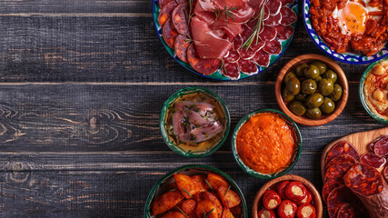 Typical spanish tapas concept, rustic style,  top view.