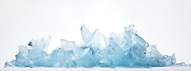 A large pile of light blue crushed ice or glass on a white background.
