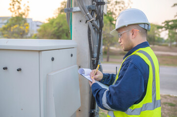 Telecommunication engineers work at cell towers for 5G cell phone signals,Network tower maintenance...