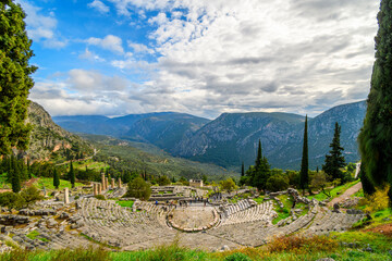 View of the ancient theater from the sacred temple complex of the Greek Oracle at Delphi, Greece at...