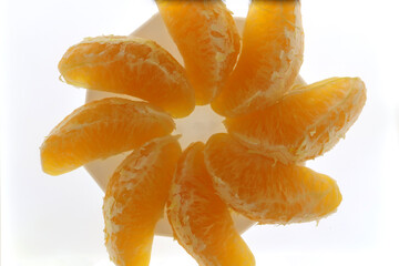 Orange slices arranged like a sunny side up on a plate