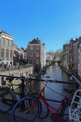 Obraz premium Netherlands, Utrecht, Oudegracht, Canals, Bikes, Antique bridge, Old city, sunny day, bikes, bicycle, architecture, canal, water, europe, holland, netherlands, travel, old, bridge, dutch, street