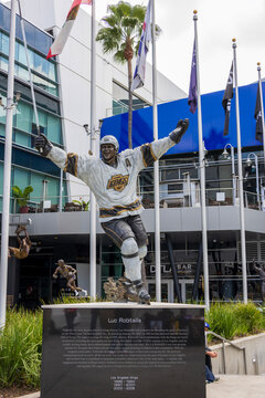 A statue of LA Kings hockey player Luc Robitaille in front of Crypto.com Arena in Los Angeles California USA