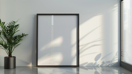 A sleek 3D wall frame mockup in matte black against a sleek glass surface, providing a contemporary space for showcasing minimalist photography or high-end prints.