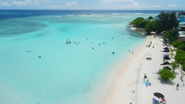 Gulhi island near Maafushi on Kaafu Atoll. Tropical Island with clear ocean and beach at Maldives. Aerial View