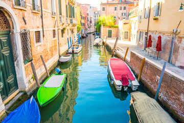 Morning in Venice street with canal, boats and gondolas - 752468899