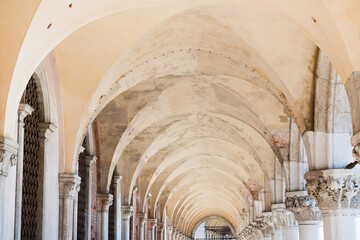 White marble arcade and columns at the doge's palace in Venice, Italy