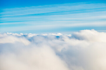 White clouds on blue sky as cloudscape background