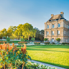 Luxembourg garden with statues, flowers and building of Luxembourg Palace. Paris, France - 752469427