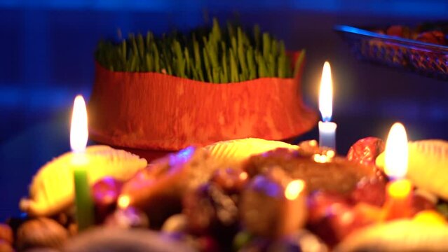 Festive table Nowruz. Customs of the Novruz holiday. Blessing of Nowruz. Celebrating Novruz around the world