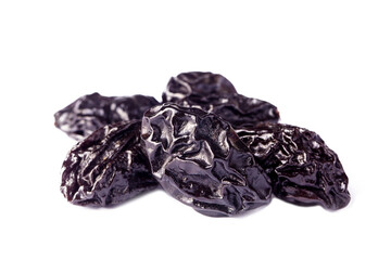 Dried plum fruit on a white background.