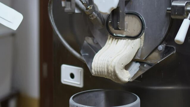 preparing ice cream with a batch freezer machine. High quality 4k footage