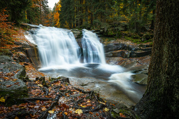 Fototapeta na wymiar Mumlava waterfall in autumn, Harrachov, Giant Mountains, Krkonose National Park, Czech Republic