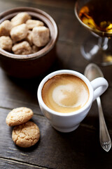 Cup of coffee on rustic wooden background. Copy space.	