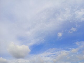 Naklejka na ściany i meble Blue sky and white clouds be used as a background.