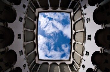 Looking up through the skylight, one is greeted by a mesmerizing view of the expansive sky, adorned...