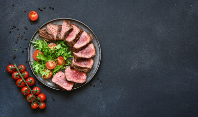 Grilled beef with arugula salad