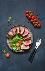 Grilled beef with arugula salad