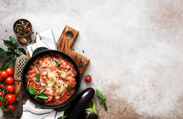 Casserole with eggplant, tomato sauce and cheese, top view, with space for text. Moussaka. - 752498495