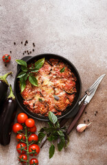 Casserole with eggplant, tomato sauce and cheese, top view, with space for text. Moussaka. - 752498835