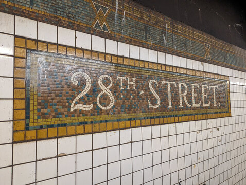 New York, NY - February 20, 2024: Mosaic subway sign for 28th Street  Station in New York