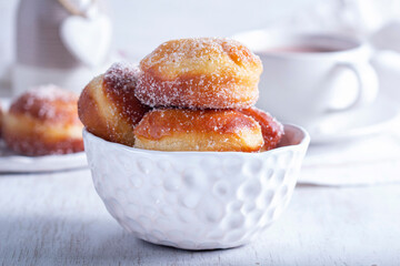Donuts with sugar and cinnamon served with cocoa. Traditional dessert for Carnival. - 752503610