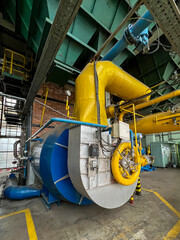 A gas burner added to an old coal boiler for burning waste gas from metallurgical technology