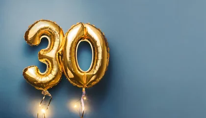 Fototapeten Banner with number 30 golden balloon with copy space. 30 years anniversary celebration © hardvicore