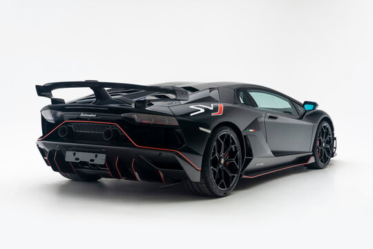  Rear end three quarters view of a matte black Lamborghini Aventador SVJ in studio - High Resolution Image, Studio