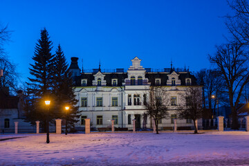 Evening view of the historic Buchholtz Palace, Poland