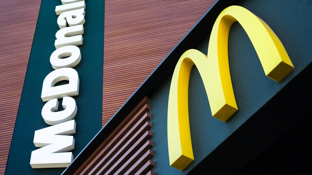 McDonald's logo. McDonald's is the world's largest chain of hamburger fast food restaurants. Minsk, Belarus - May 15, 2022