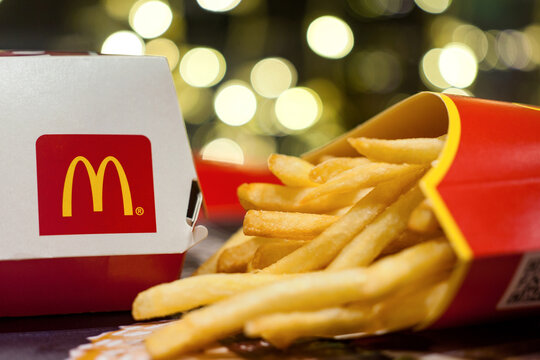 Big Mac Box with McDonald's logo and French fries in McDonald's Restaurant. Minsk, Belarus, January 3, 2022