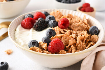 Breakfast with yogurt cereals and berries. - 752521872