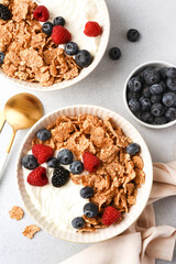 Breakfast with yogurt cereals and berries. - 752522014