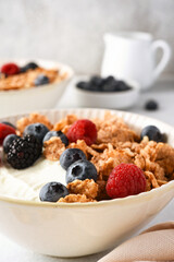 Breakfast with yogurt cereals and berries. - 752522019