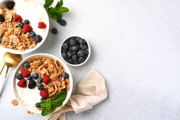 Breakfast with yogurt cereals and berries. - 752522068